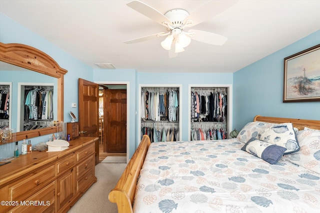 125 Bloomfield Rd, Barnegat, NJ 08005 - bedroom featuring two closets, a sink, light carpet, and ceiling fan