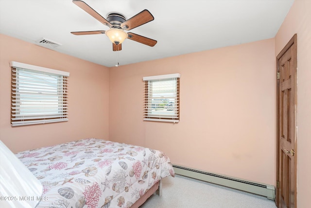 125 Bloomfield Rd, Barnegat, NJ 08005 - bedroom with a baseboard heating unit, light colored carpet, and ceiling fan