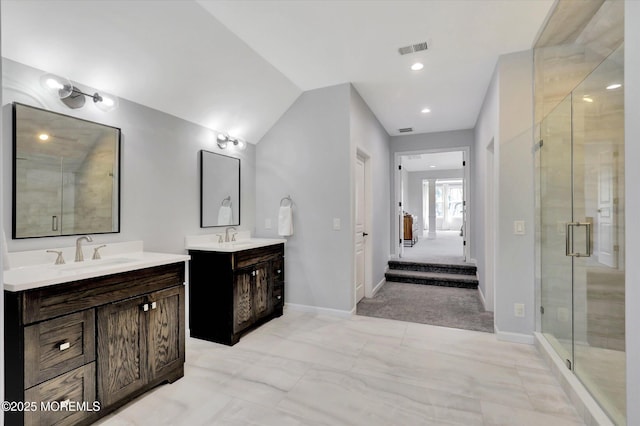 64 Sage St, Holmdel, NJ 07733 - bathroom featuring a shower stall, two vanities, baseboards, lofted ceiling, and marble finish flooring