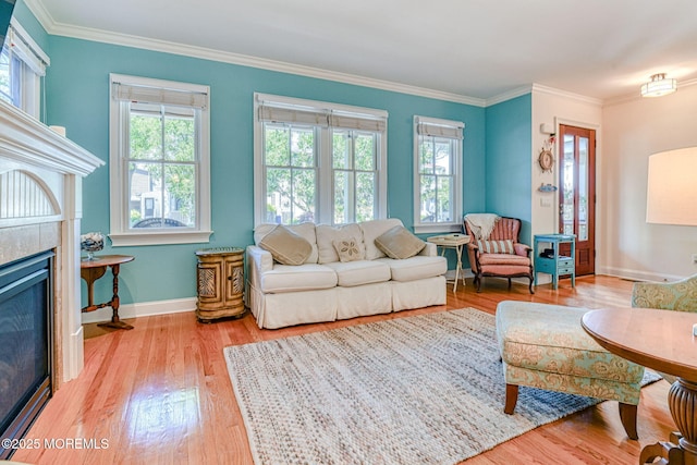 78 Cookman Ave, Ocean Grove, NJ 07756 - living area with a tile fireplace, wood finished floors, baseboards, and crown molding