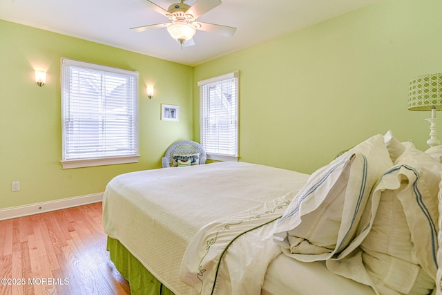 78 Cookman Ave, Ocean Grove, NJ 07756 - bedroom featuring multiple windows, light wood-style flooring, baseboards, and ceiling fan