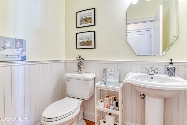 78 Cookman Ave, Ocean Grove, NJ 07756 - half bath featuring wainscoting, toilet, and a sink