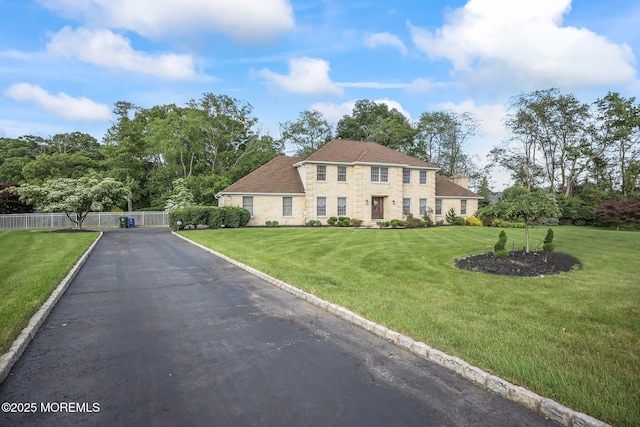 21 Windswept Ln, Freehold, NJ 07728 - colonial home with stone siding and a shingled roof