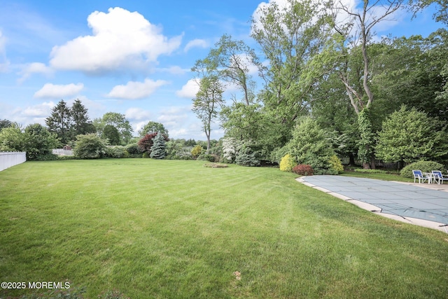21 Windswept Ln, Freehold, NJ 07728 - view of yard featuring a covered pool