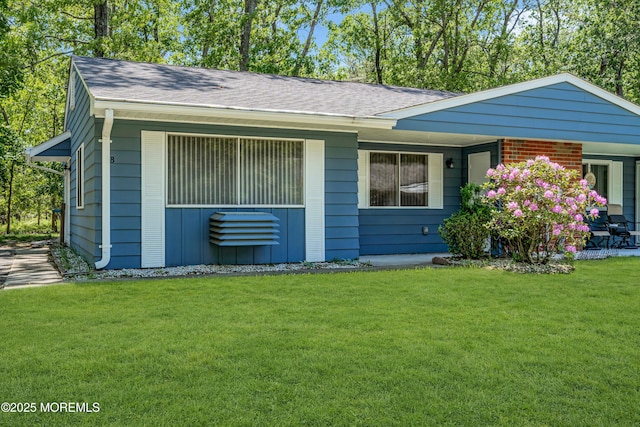 59 Maryland Ave Unit B, Whiting, NJ 08759 - view of front of home with a front yard and a shingled roof