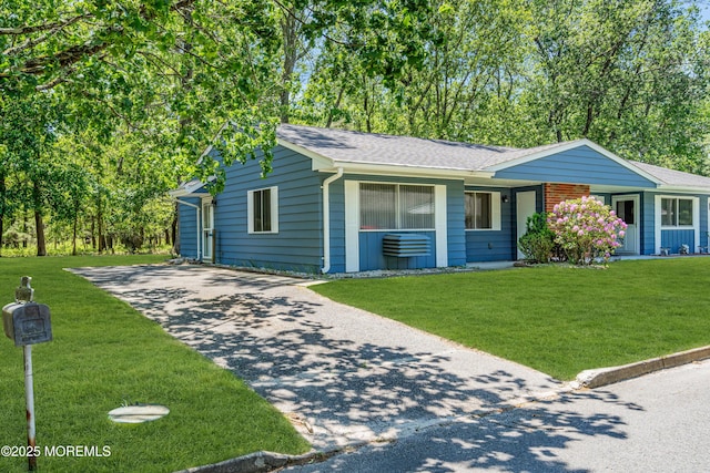 59 Maryland Ave Unit B, Whiting, NJ 08759 - ranch-style home featuring concrete driveway, a front lawn, and roof with shingles