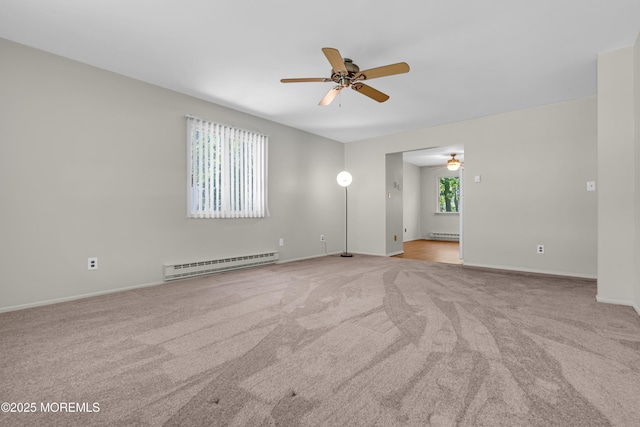 59 Maryland Ave Unit B, Whiting, NJ 08759 - carpeted spare room with baseboard heating, a ceiling fan, baseboards, and a baseboard radiator