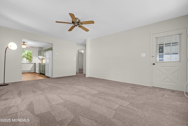59 Maryland Ave Unit B, Whiting, NJ 08759 - unfurnished living room with ceiling fan, light colored carpet, a baseboard heating unit, and baseboards
