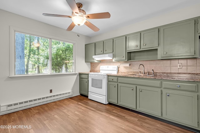 59 Maryland Ave Unit B, Whiting, NJ 08759 - kitchen featuring green cabinetry, white electric range, baseboard heating, range hood, and a sink