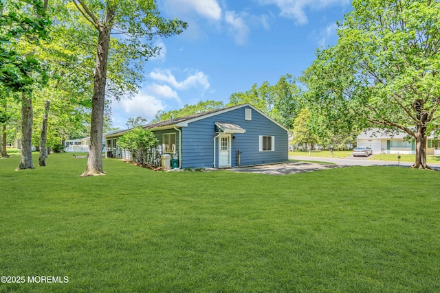 59 Maryland Ave Unit B, Whiting, NJ 08759 - rear view of house with a yard