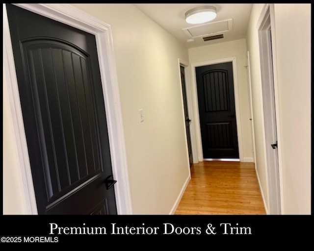123 France St, Toms River, NJ 08753 - corridor with attic access, light wood-style floors, and baseboards