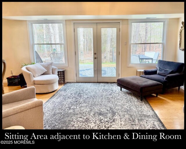 123 France St, Toms River, NJ 08753 - living area featuring french doors and wood finished floors