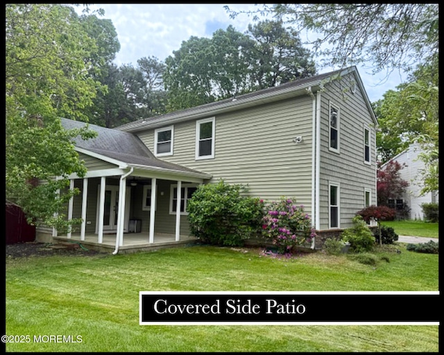 123 France St, Toms River, NJ 08753 - rear view of property with a lawn