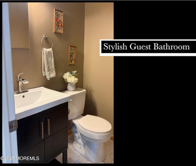 123 France St, Toms River, NJ 08753 - bathroom featuring vanity, toilet, and tile patterned floors