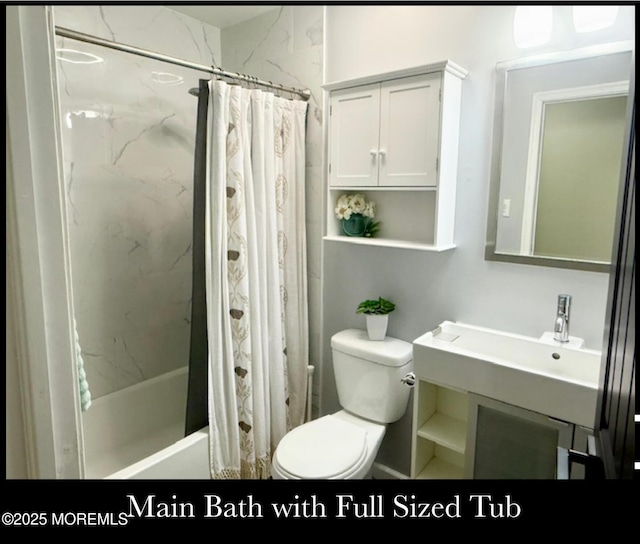 123 France St, Toms River, NJ 08753 - bathroom featuring toilet, shower / bath combo with shower curtain, and vanity