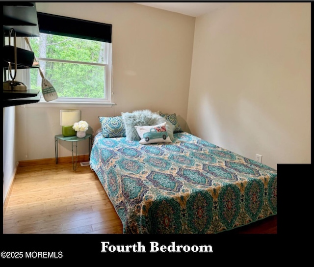 123 France St, Toms River, NJ 08753 - bedroom featuring wood finished floors and baseboards
