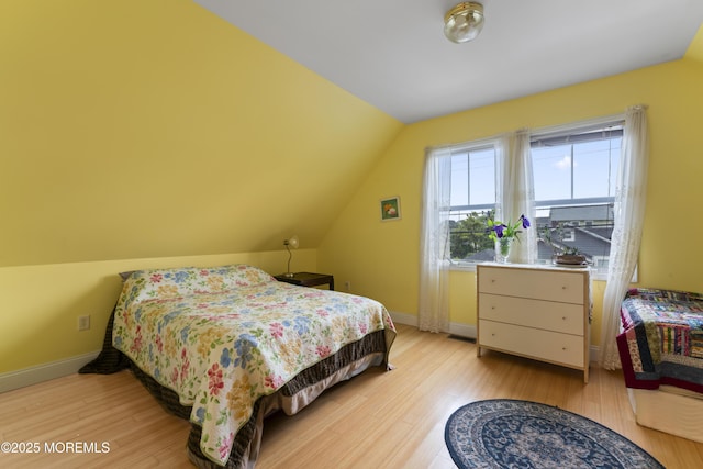 134 Franklin Ave, Ocean Grove, NJ 07756 - bedroom featuring light wood-style floors, vaulted ceiling, and baseboards