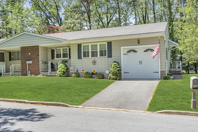 4 Delaware Way Unit A, Whiting, NJ 08759 - ranch-style house with driveway, an attached garage, and a front lawn