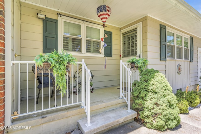 4 Delaware Way Unit A, Whiting, NJ 08759 - view of exterior entry featuring a porch