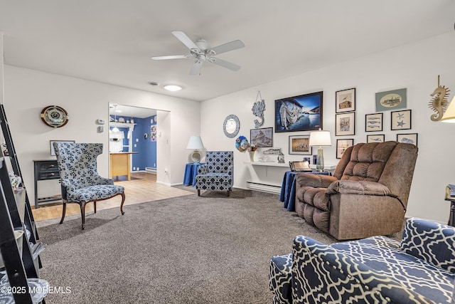 4 Delaware Way Unit A, Whiting, NJ 08759 - carpeted living area with ceiling fan, baseboards, and a baseboard radiator