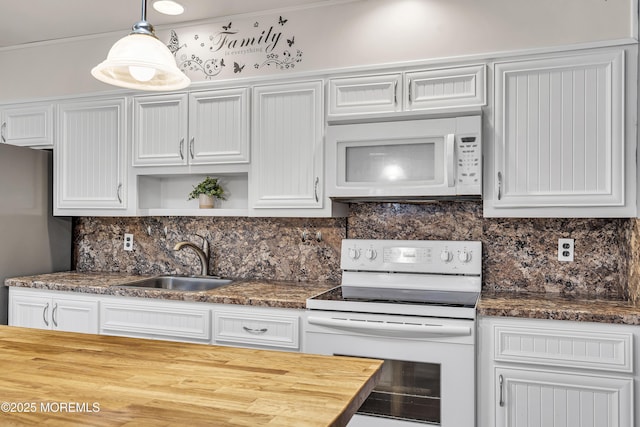 4 Delaware Way Unit A, Whiting, NJ 08759 - kitchen featuring white appliances, a sink, wooden counters, decorative backsplash, and white cabinetry