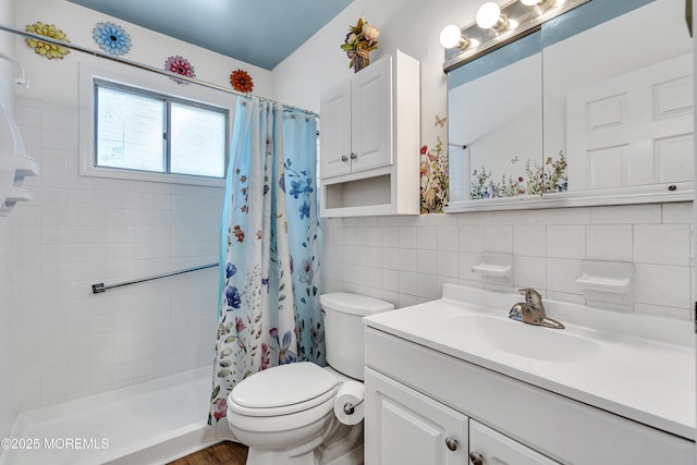 4 Delaware Way Unit A, Whiting, NJ 08759 - bathroom featuring toilet, tile walls, tiled shower, vanity, and backsplash