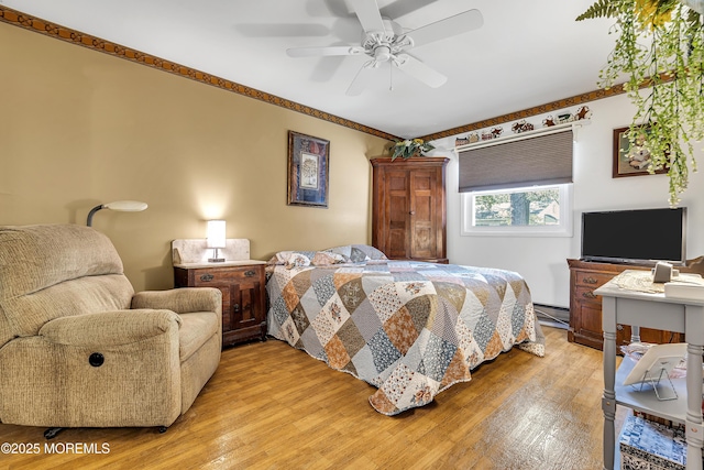 4 Delaware Way Unit A, Whiting, NJ 08759 - bedroom featuring a baseboard radiator, light wood-style flooring, and a ceiling fan
