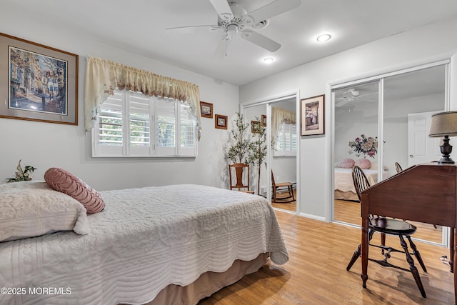 4 Delaware Way Unit A, Whiting, NJ 08759 - bedroom with two closets, light wood-style flooring, and a ceiling fan