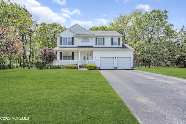 1 Overlook Ct, Manchester, NJ 08759 - traditional home featuring a porch, driveway, a garage, and a front lawn