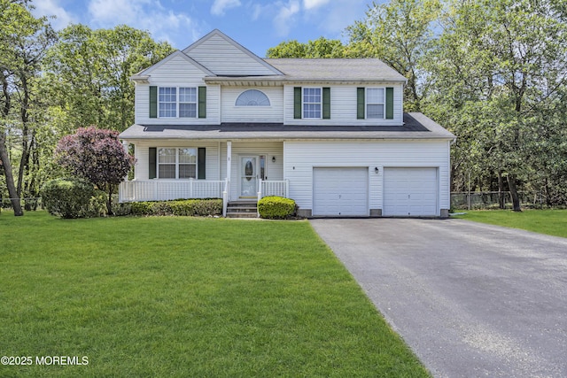 1 Overlook Ct, Manchester, NJ 08759 - traditional-style house with driveway, an attached garage, and covered porch