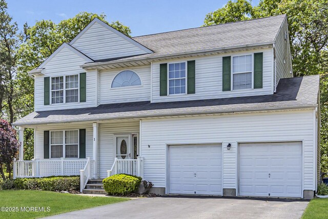 1 Overlook Ct, Manchester, NJ 08759 - view of front facade featuring a porch, an attached garage, driveway, and roof with shingles