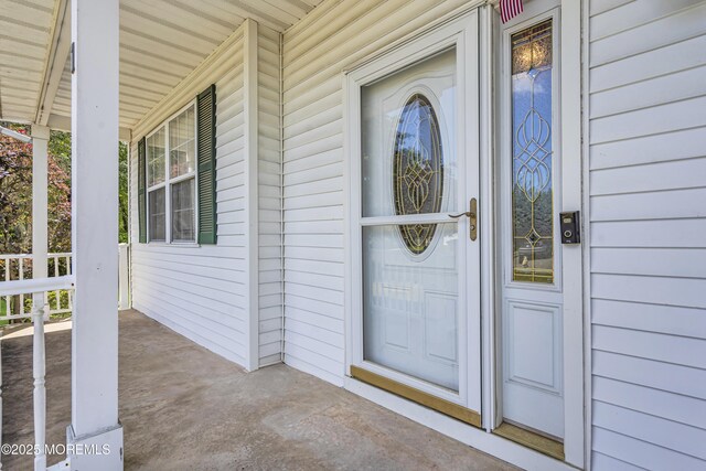 1 Overlook Ct, Manchester, NJ 08759 - view of exterior entry featuring a porch