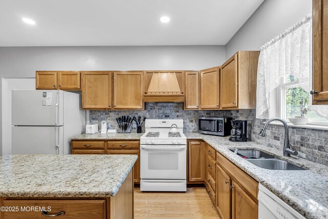1 Overlook Ct, Manchester, NJ 08759 - kitchen with white appliances, custom exhaust hood, a sink, decorative backsplash, and light stone countertops