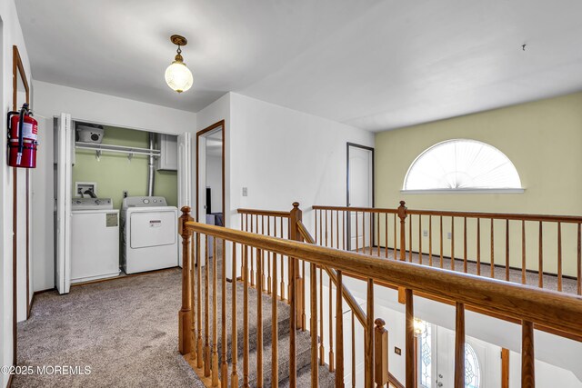 1 Overlook Ct, Manchester, NJ 08759 - hall with washer and dryer, an upstairs landing, and carpet