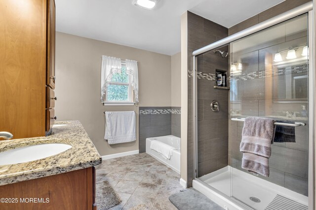 1 Overlook Ct, Manchester, NJ 08759 - bathroom with a bath, double vanity, a shower stall, and baseboards