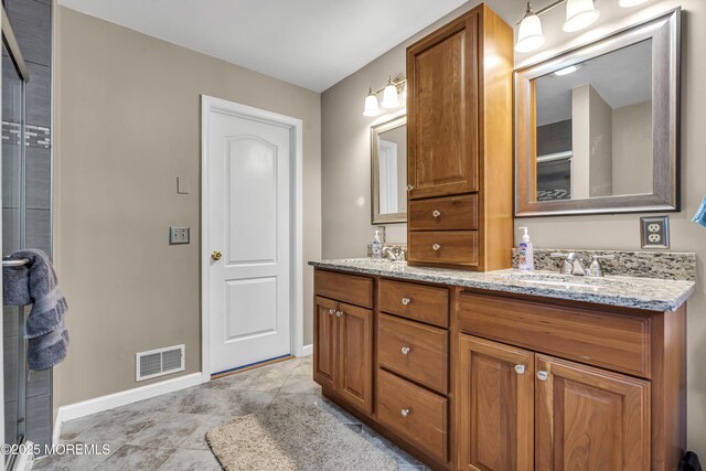 1 Overlook Ct, Manchester, NJ 08759 - bathroom featuring double vanity and baseboards