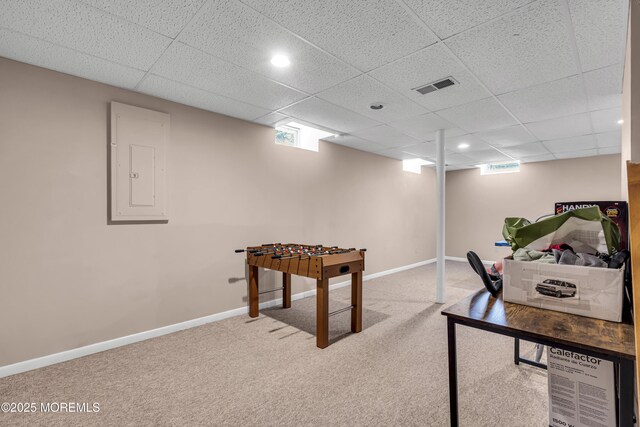 1 Overlook Ct, Manchester, NJ 08759 - rec room with electric panel, light carpet, a paneled ceiling, baseboards, and recessed lighting