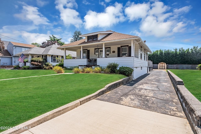 54 Wall St, West Long Branch, NJ 07764 - bungalow-style home with a front yard, a porch, and roof with shingles