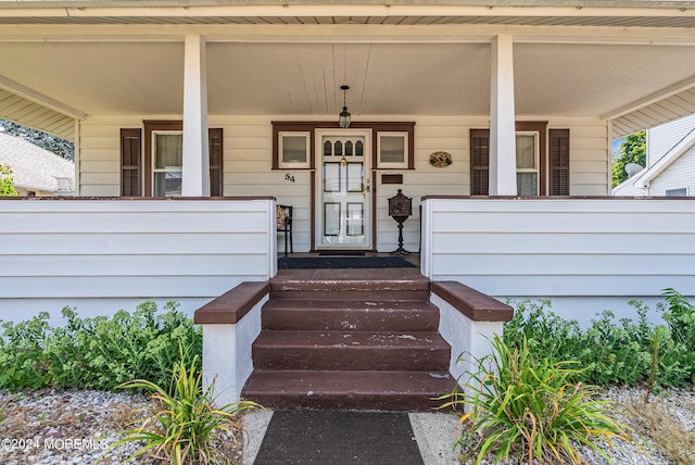 54 Wall St, West Long Branch, NJ 07764 - doorway to property featuring covered porch