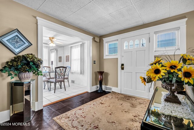 54 Wall St, West Long Branch, NJ 07764 - entryway featuring baseboards, a ceiling fan, and a paneled ceiling