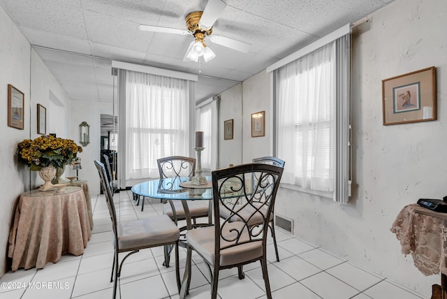 54 Wall St, West Long Branch, NJ 07764 - dining space with healthy amount of natural light, a ceiling fan, and light tile patterned floors