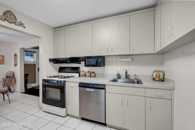 54 Wall St, West Long Branch, NJ 07764 - kitchen featuring gas range oven, dishwasher, a sink, black microwave, and under cabinet range hood