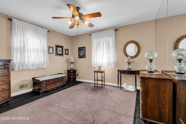 54 Wall St, West Long Branch, NJ 07764 - sitting room featuring a ceiling fan, baseboards, and dark carpet