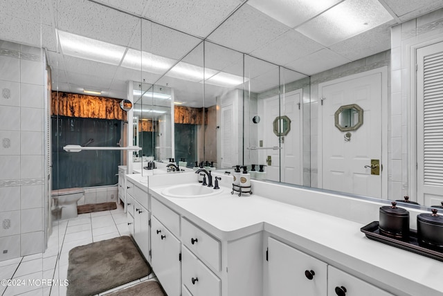54 Wall St, West Long Branch, NJ 07764 - bathroom featuring tile patterned floors, vanity, toilet, a stall shower, and a closet