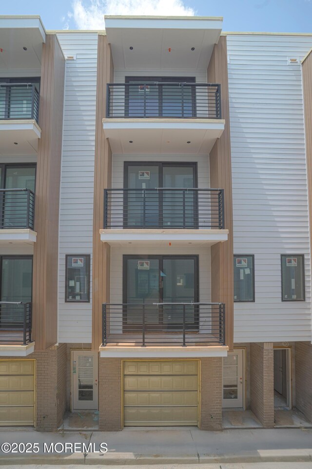 500 Ocean Ter Unit 9, Seaside Heights, NJ 08751 - view of building exterior with an attached garage