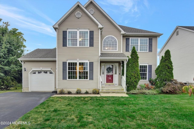 203 Conifer Crest Way, Eatontown, NJ 07724 - traditional-style home featuring asphalt driveway, a garage, and a front yard