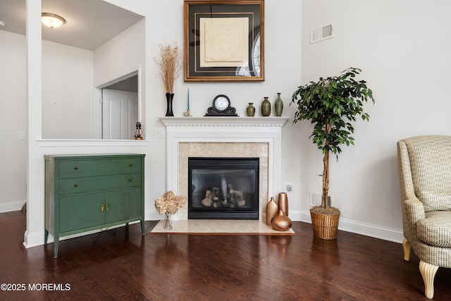 38 Point Pleasant Ln, Waretown, NJ 08758 - living room featuring dark wood-style flooring, a high end fireplace, and baseboards