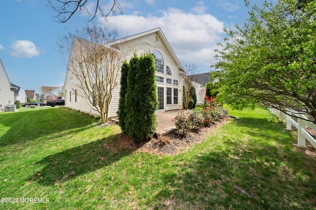 38 Point Pleasant Ln, Waretown, NJ 08758 - view of property exterior with a patio, a lawn, and central AC