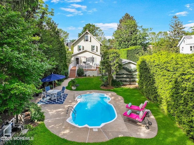 85 Virginia Ave, Manasquan, NJ 08736 - rear view of property with an outdoor pool and a patio area