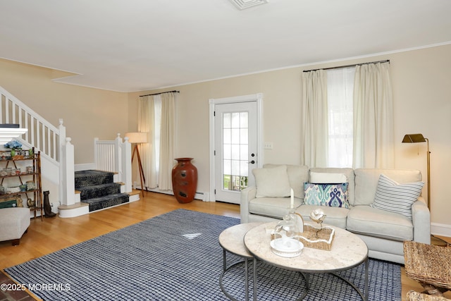 85 Virginia Ave, Manasquan, NJ 08736 - living room with stairs, wood finished floors, and crown molding